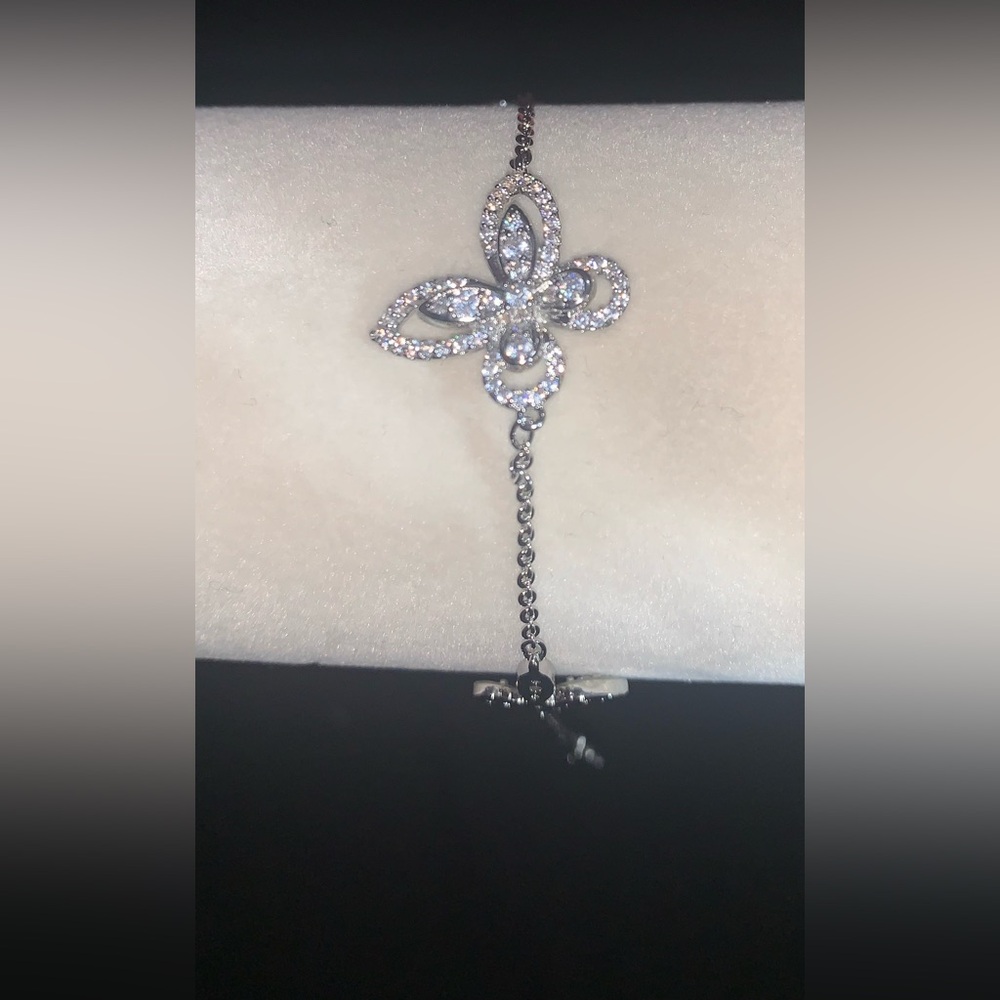NWOT. Silver Butterfly Bracelet with 2 Accent pieces.